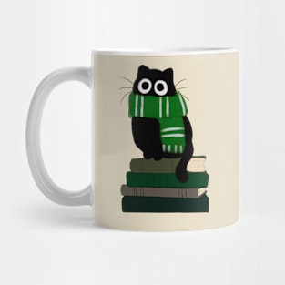 cat with green scarf on book stack Mug